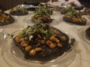Marinated and grilled stuffed portabella with corn and tofu