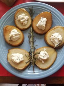 Pears baked in honey, rosemary with goat cheese
